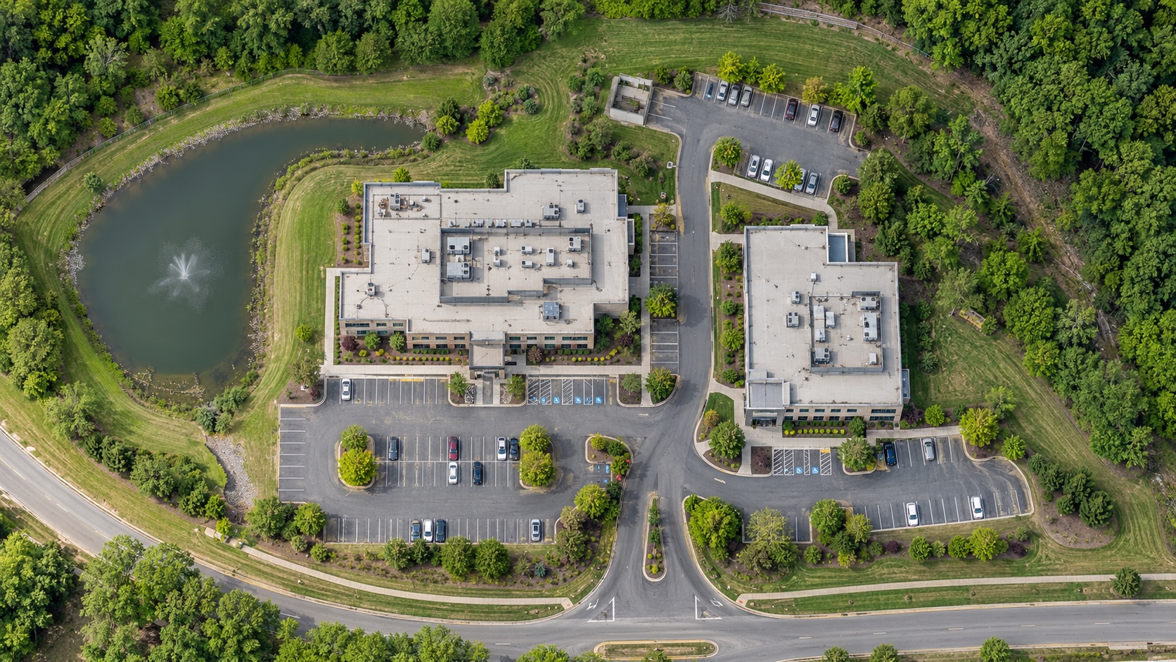 Illustrative orthomosaic-style overhead view of a commercial site